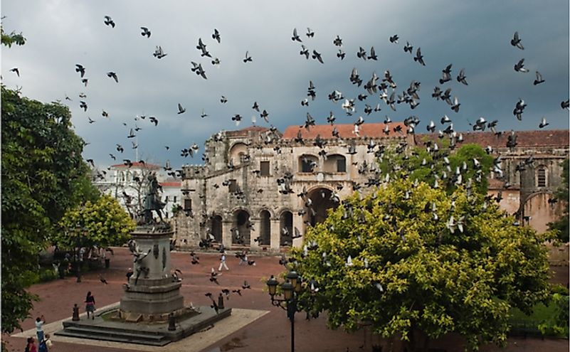 Doves flying over the main square in Santo Domingo, Dominican Republic.