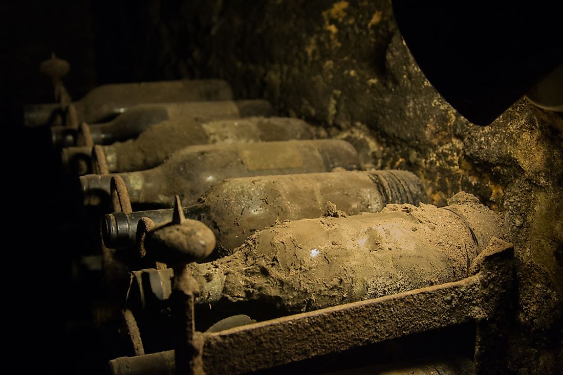 Old wine bottles kept in a cave. 