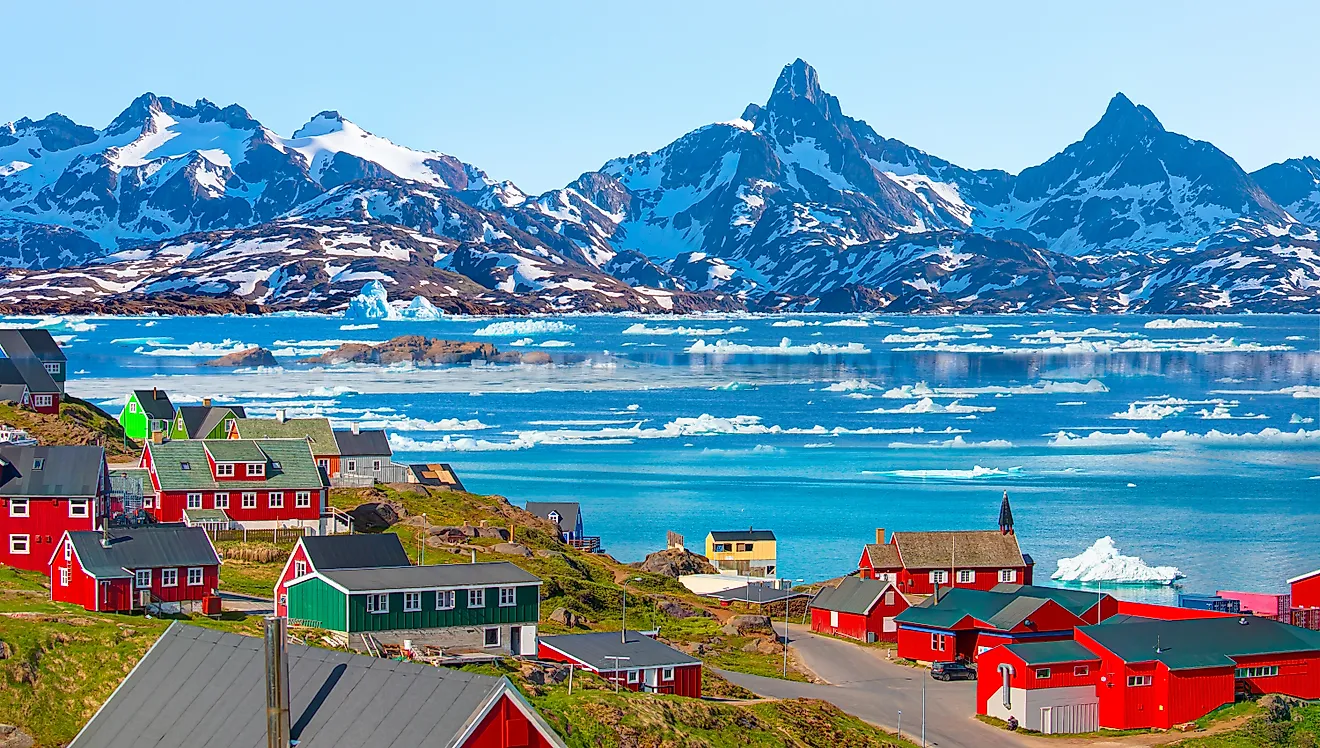 Picturesque village on coast of Greenland - Colorful houses in Tasiilaq, East Greenland