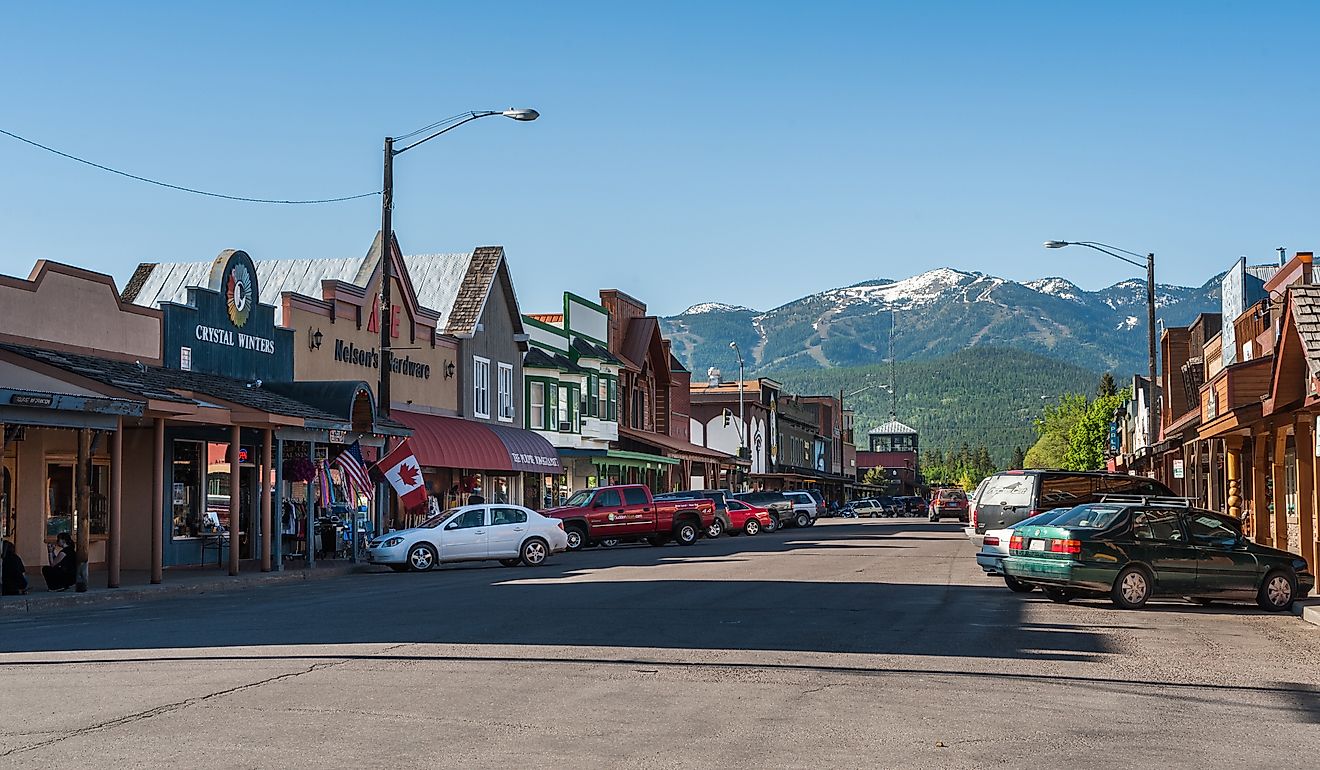 Downtown Whitefish Montana with the ski resort in the distance. (Editorial credit: Beeldtype / Shutterstock.com)