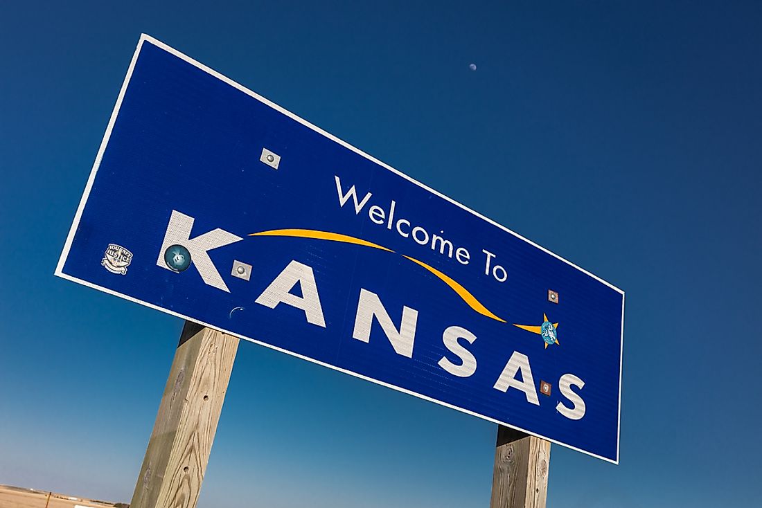 A sign marking the Kansas border. 