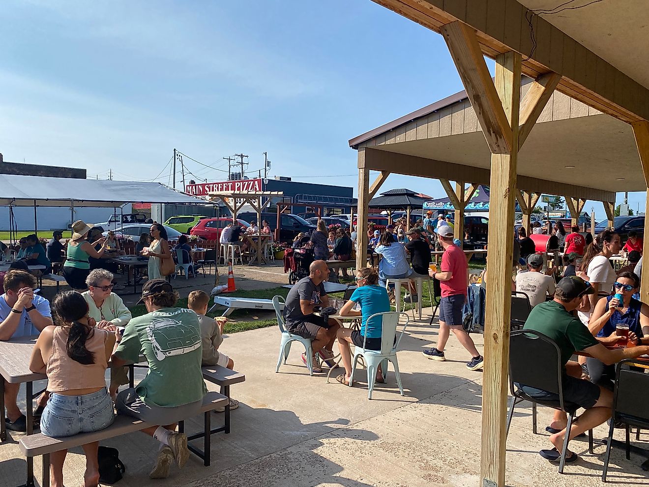 A mix of locals and visitors gather at East Channel Brewing CO’s outdoor patio to register for the Grand Island Marathon and carbo-load with wood-fired pizza. Image credit: Andrew Douglas