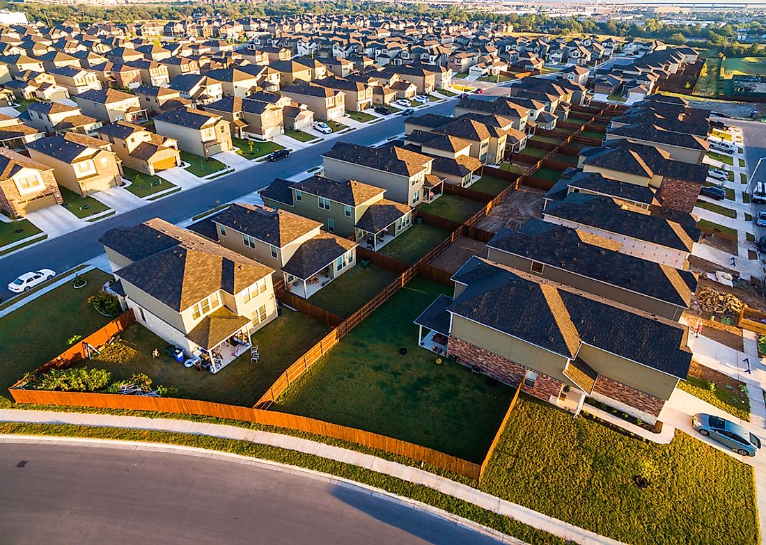 Suburbs are usually characterizted by rows of houses that who not much differ from one another.
