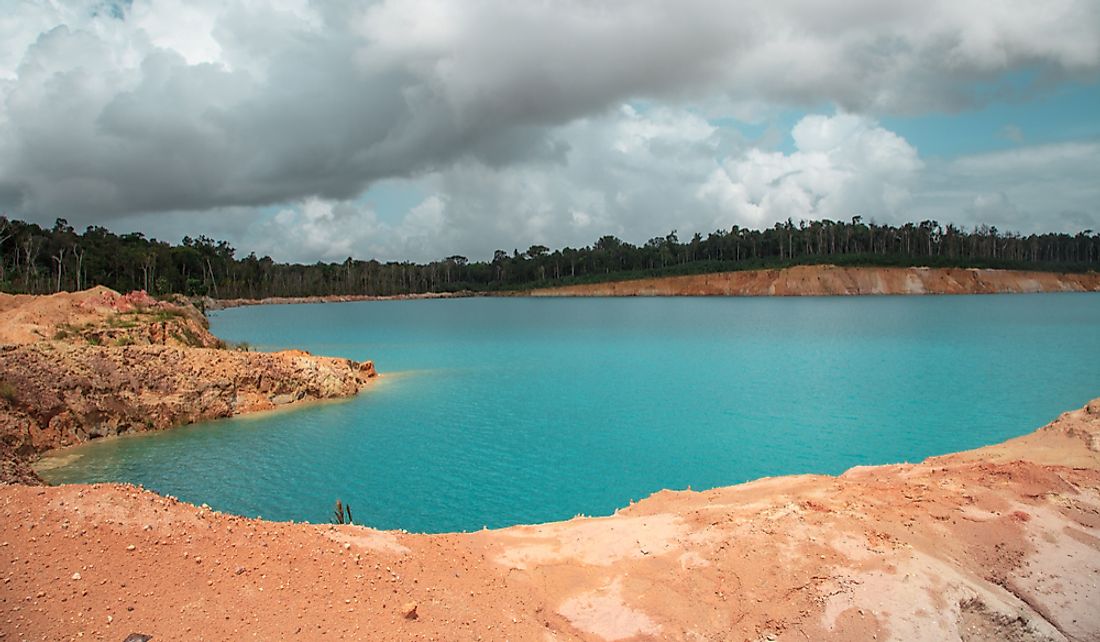 Blue lake in a former bauxite mining pit in Guana. 
