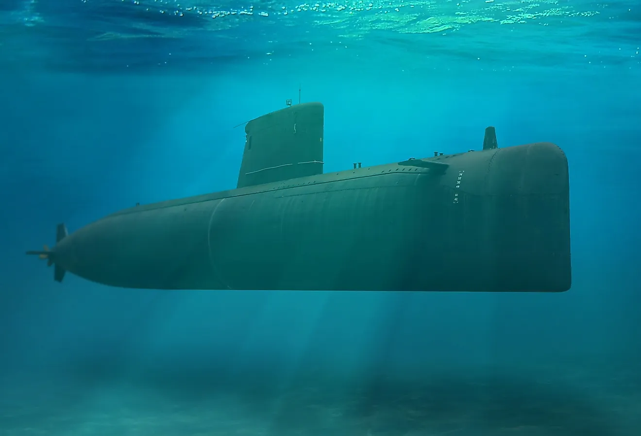 Naval submarine submerged deep underwater. Image credit: noraismail/Shutterstock