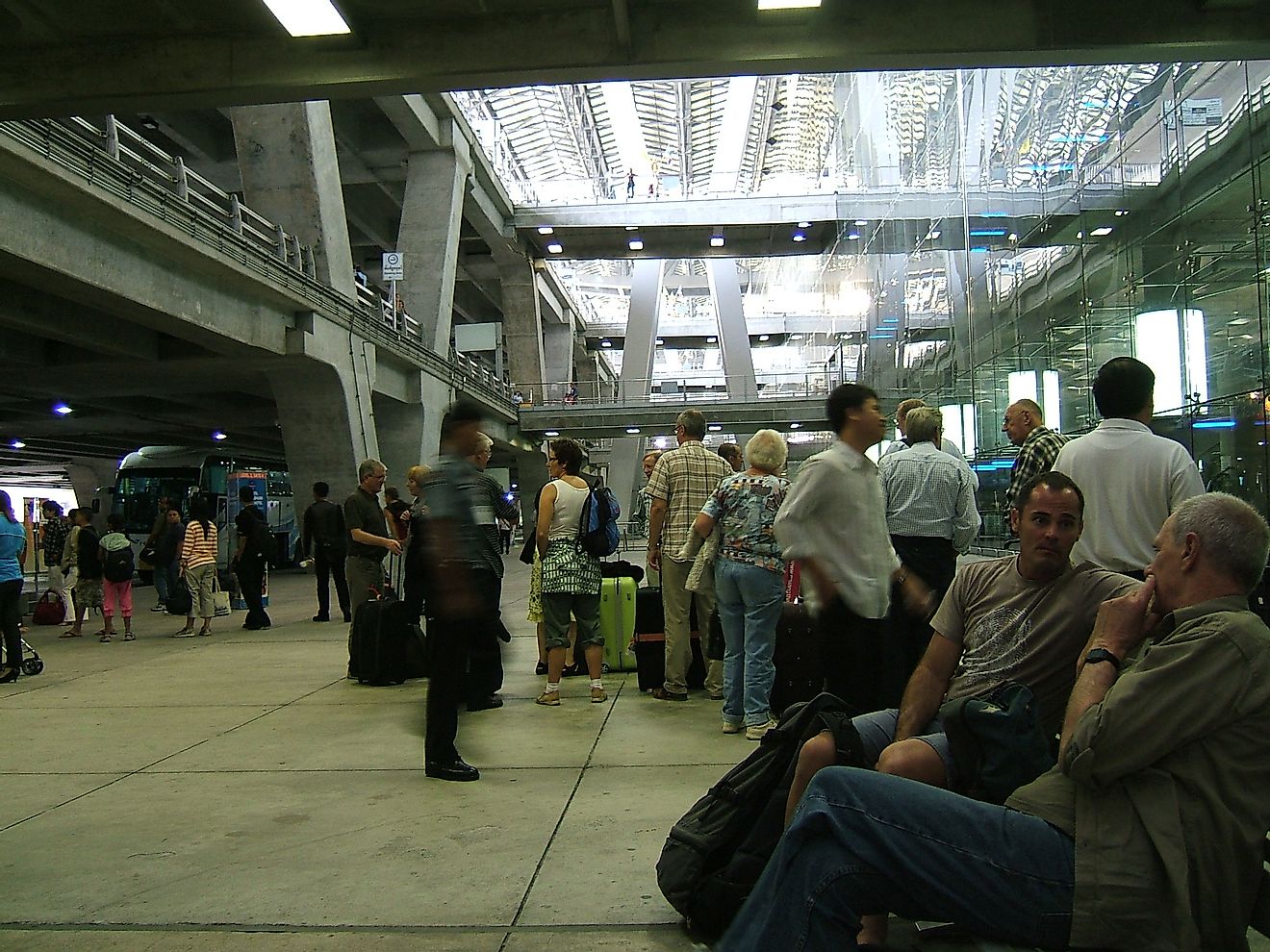 Talking with co-passengers is a great way to spend your time at the airport. Image credit: Shankar s./Flickr.com