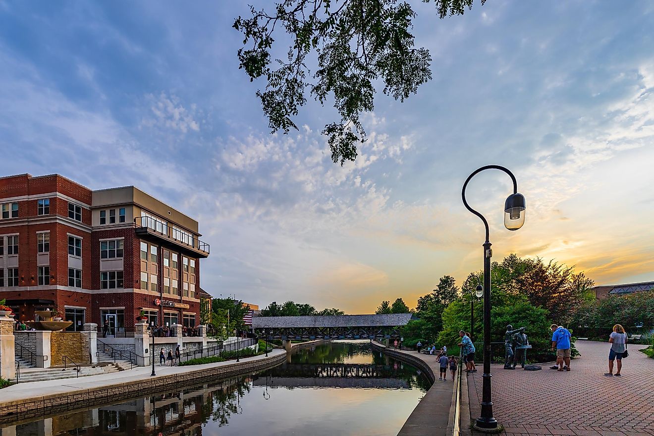 Downtown Naperville Riverwalk on a busy Saturday night features plenty of restaurants, bars, art, entertainment, and architecture.