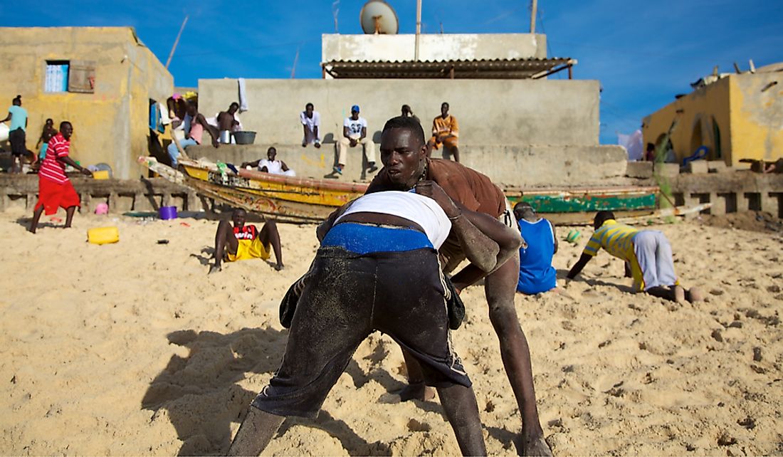 Senegalese wrestling is traditionally performed by the Serer people.  Editorial credit: Watch The World / Shutterstock.com