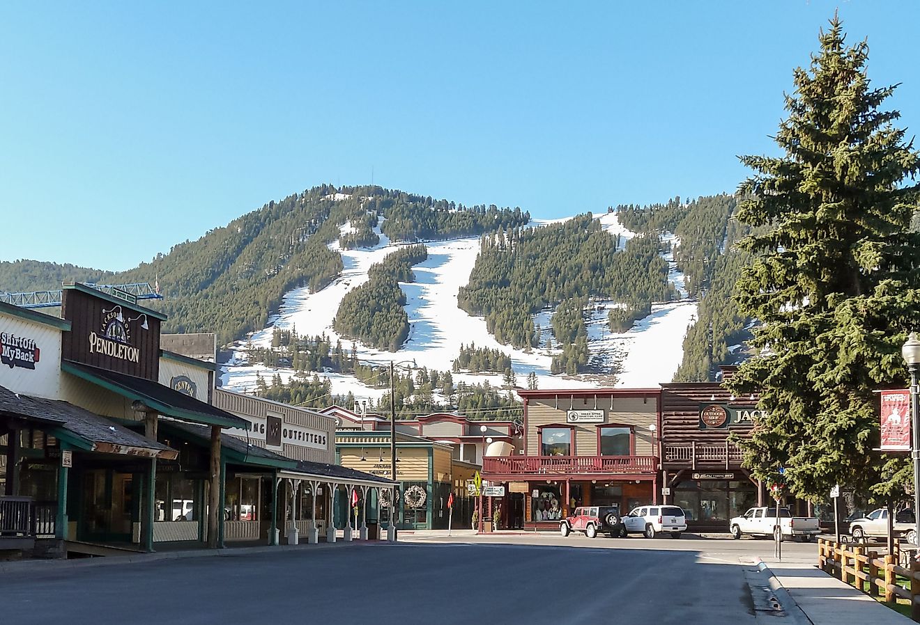 Ski slopes in Jackson Hole, Wyoming with panorama of vintage houses.