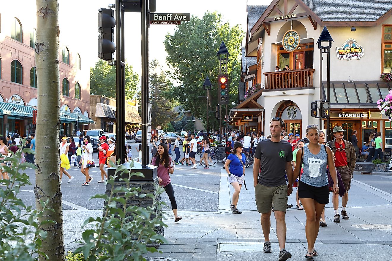 Visitors walking and shopping at Banff's main avenue.