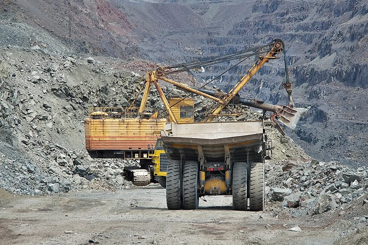 Iron Ore being excavated from an open pit mine.