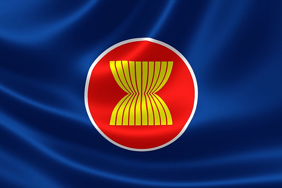 The flag features the ASEAN emblem of yellow paddy stalks. 
