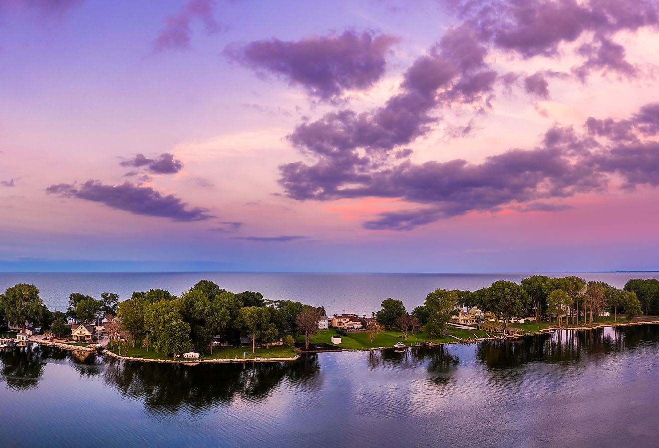 Aerial panorama of the Cedar Point peninsula at dusk, in Sandusky, Ohio, on Erie Lake.