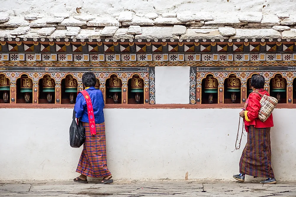 Bhutanese people at a temple. 