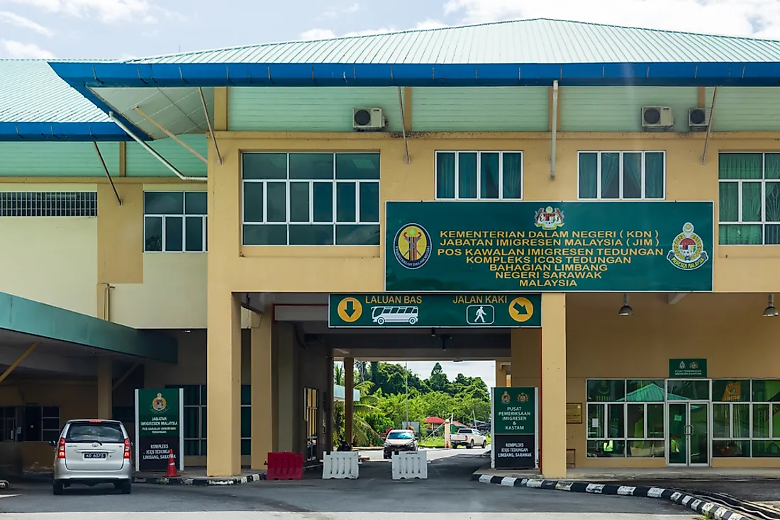 The border crossing between Malaysia and Brunei. Editorial credit: Uwe Aranas / Shutterstock.com.