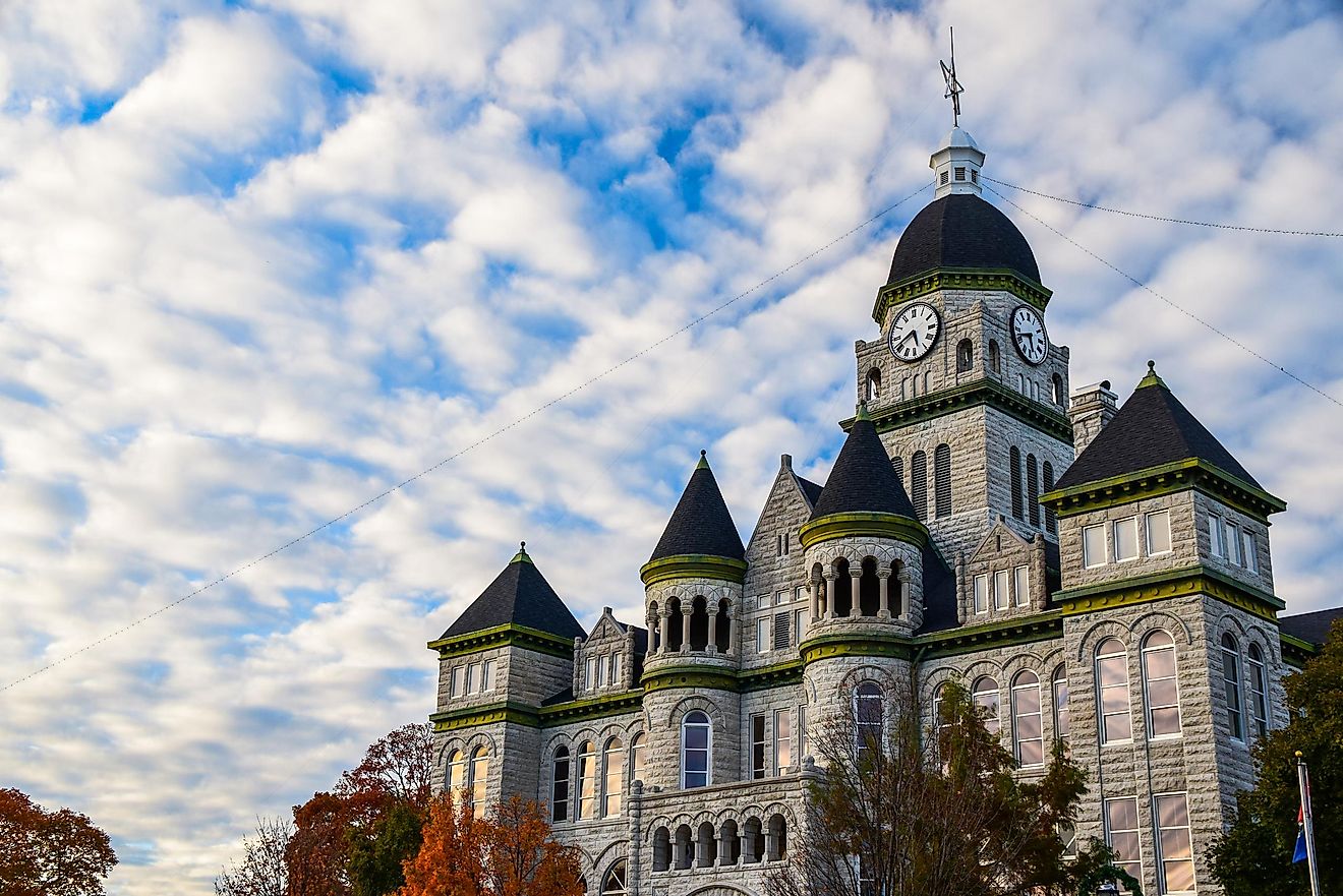 Carthage, Missouri, USA - November 4, 2021: The Carthage Courthouse with fall foliage downtown in one of the best small towns in Missouri. This is one of the most photographed buildings in Missouri.