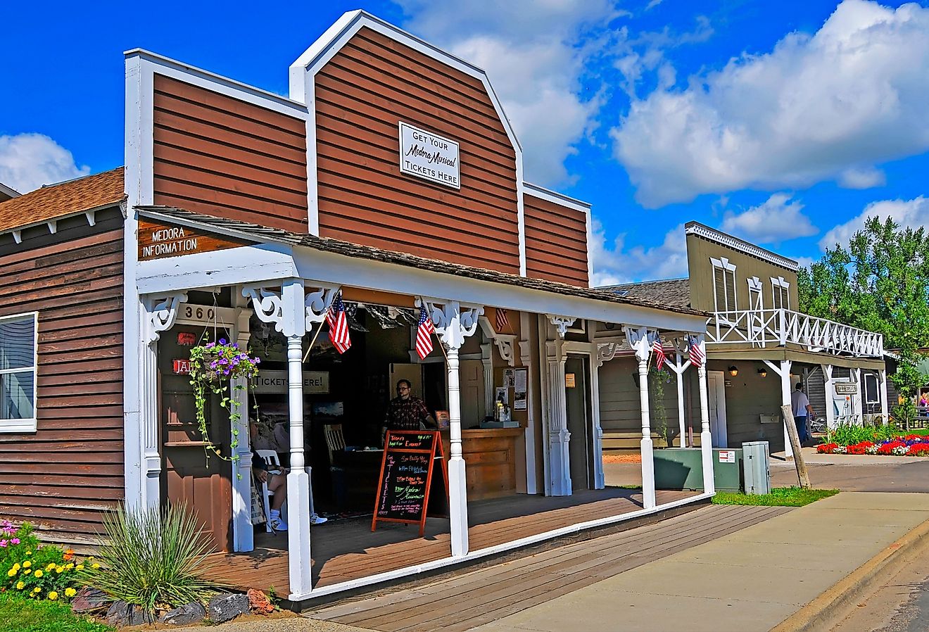 Shops in Medora, North Dakota. Image credit Dennis MacDonald via Shutterstock.
