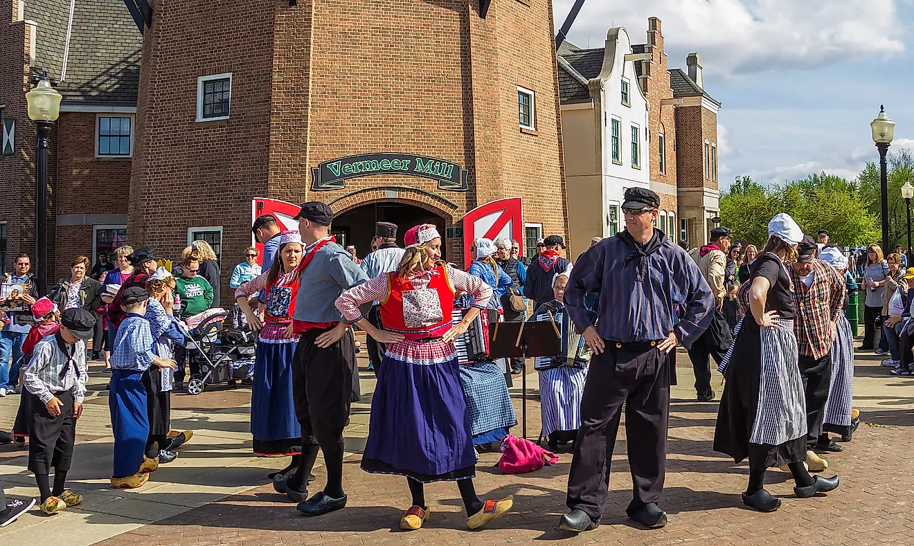 A Dutch folk dance performance in traditional costume.