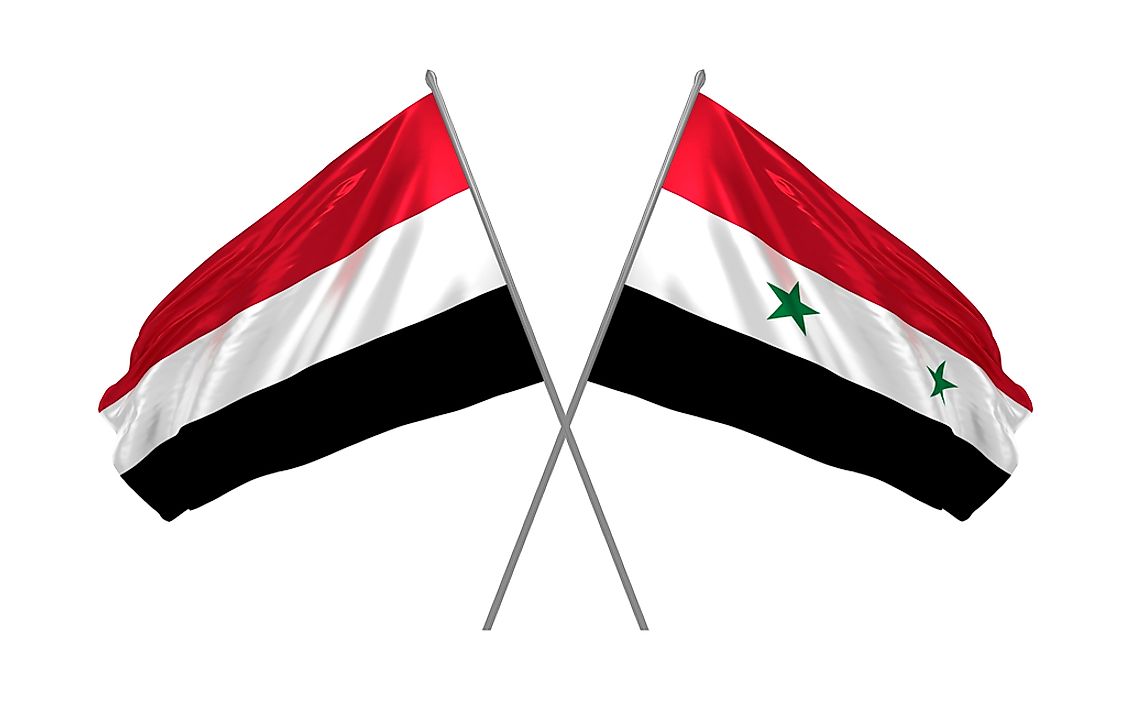 The flag of Yemen, left, and the flag of Syria. 