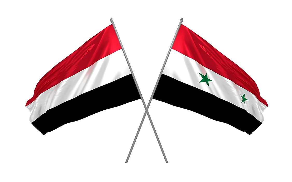 The flag of Yemen, left, and the flag of Syria. 