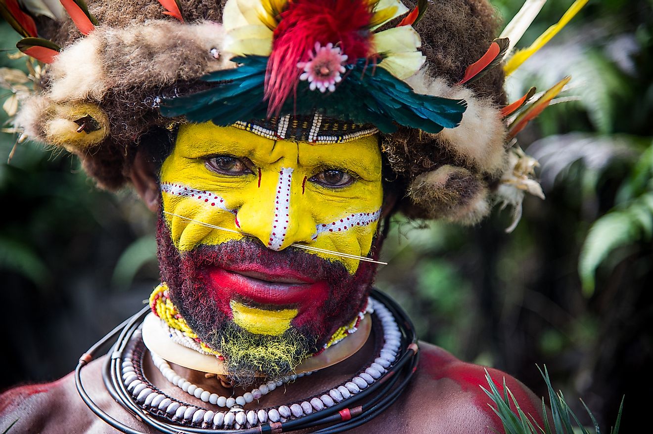  The men of the Huli tribe in Tari area of Papua New Guinea in traditional clothes and face paint. Image credit: Amy Nichole Harris/Shutterstock.com