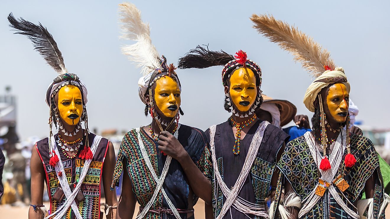 Gerewal Mbororo Wodaabe nomads have a yearly beauty competition colorful makeup in traditional clothes with the goal of seducing the women judges. Image credit: Katya Tsvetkova/Shutterstock
