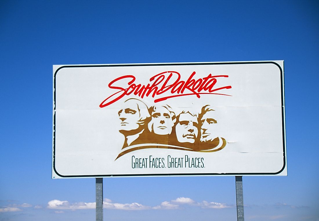 A sign welcoming visitors to South Dakota.