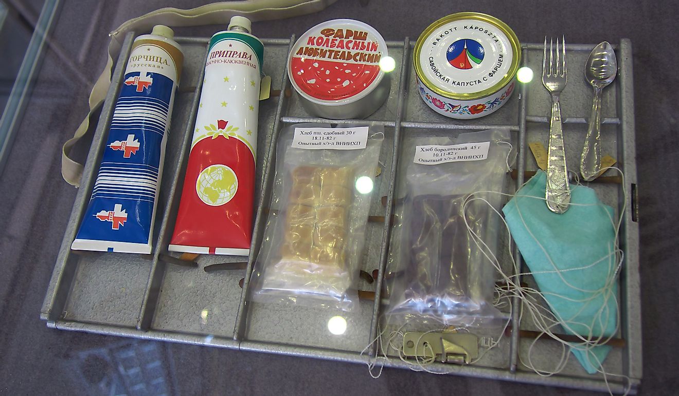 Packing with portions of food for space flight.