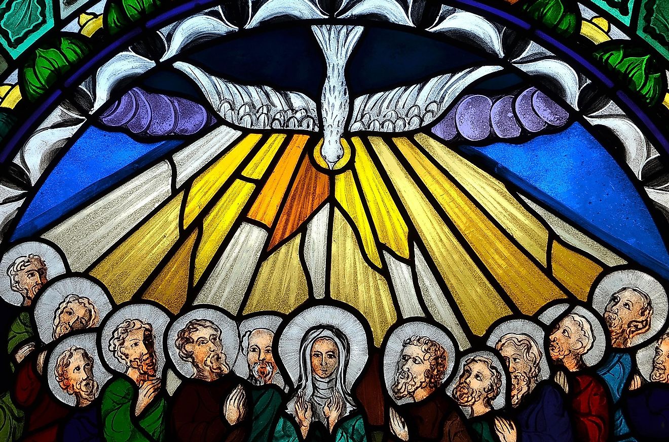 Stained glass window depicting Pentecost.