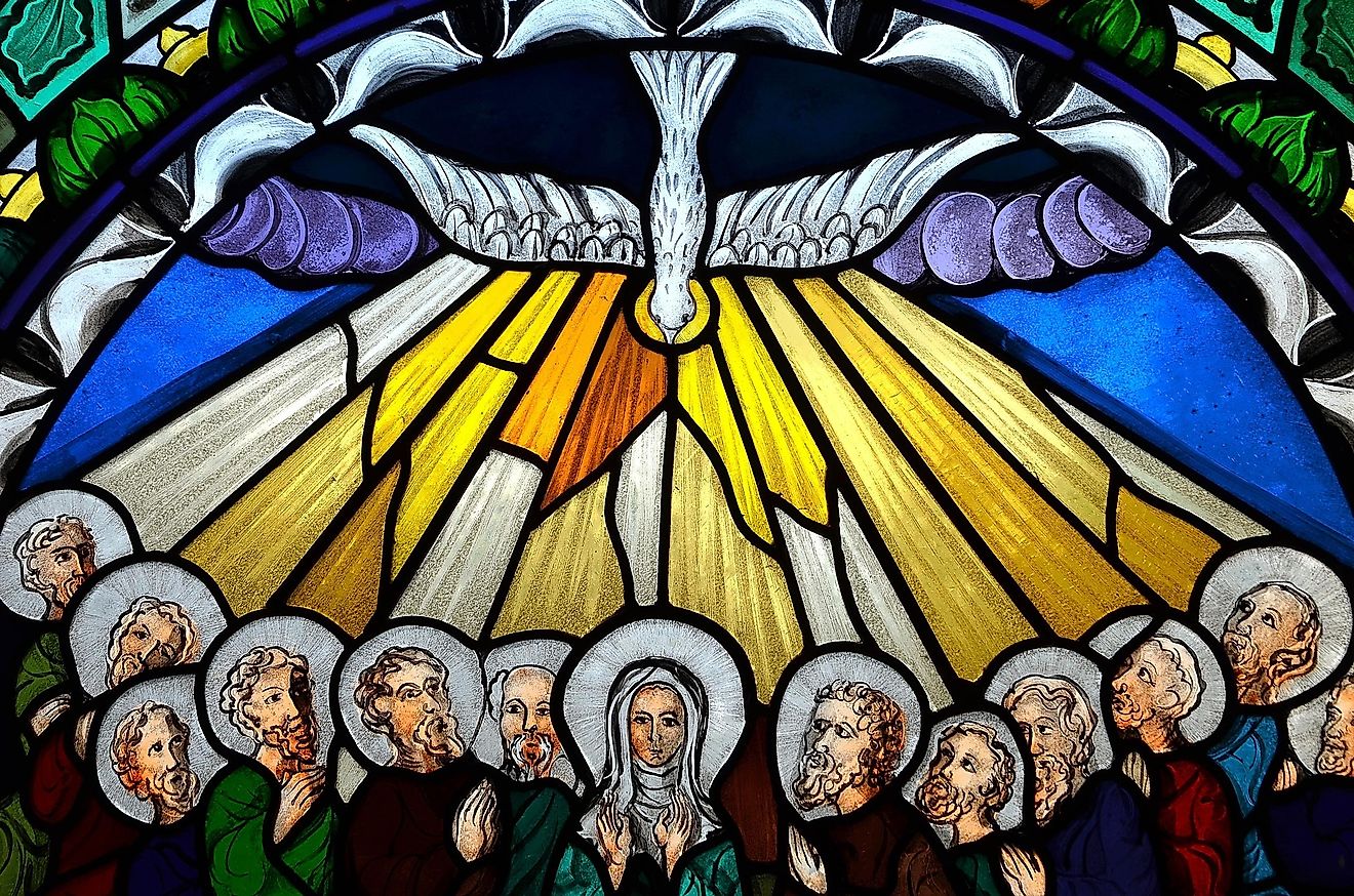 Stained glass window depicting Pentecost.