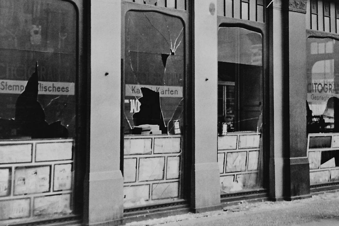 The broken windows of a Jewish printing shop. 