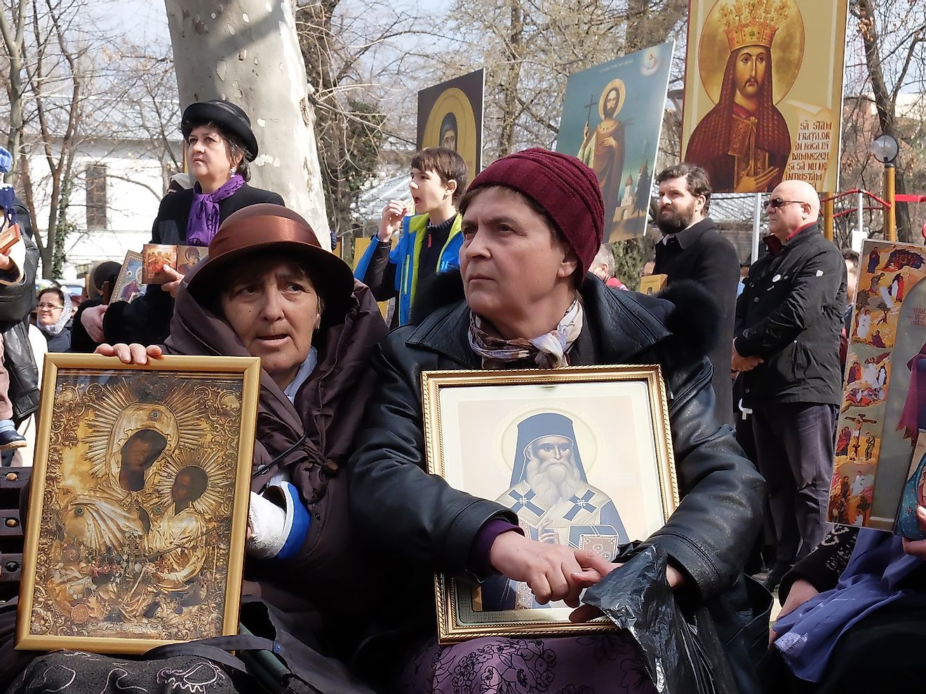 Orthodox believers are praying during cultural manifestation "The Icon - Window to God" which marks the celebration of the Orthodoxy Sunday. Image credit: Gabriel Petrescu/Shutterstock.com