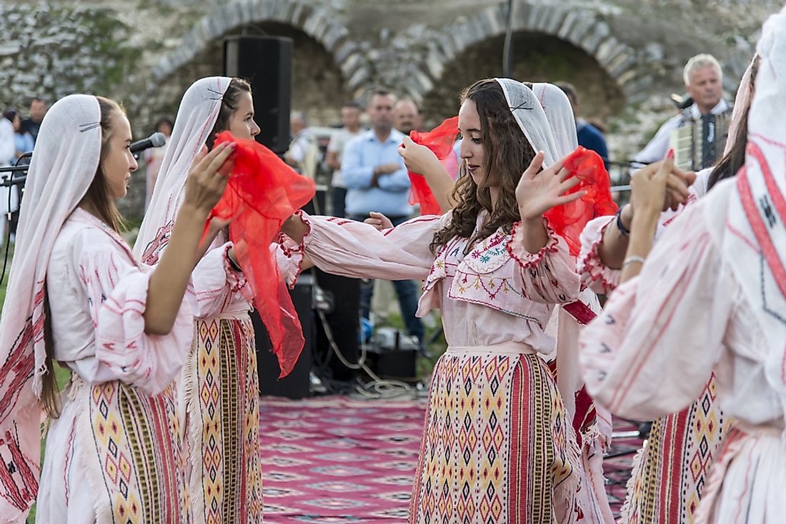 Women in traditional dress in Albania. Editorial credit: Daniel Reiner / Shutterstock.com. 