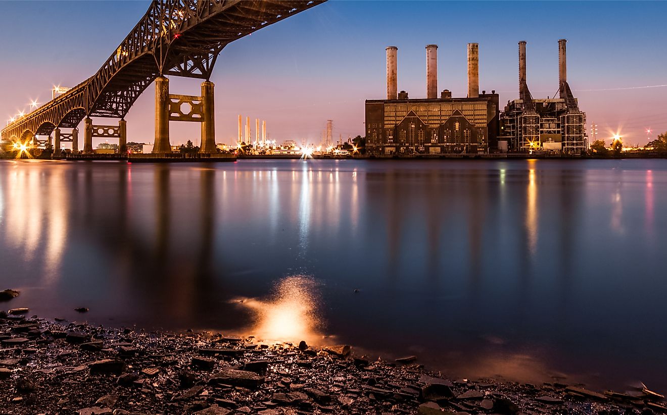 A power station in Jersey City, New Jersey. New Jersey is one of only nine states that participate in the Regional Greenhouse Gas Initiative. Mihai_Andritoiu / Shutterstock.com.