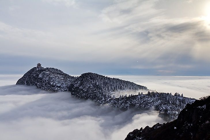 Mountaintops break through the clouds in Emeishan National Park.