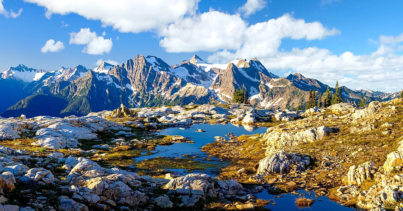 Sunrise Illuminates Beautiful Mountains and Ponds In North Cascades National Park, Washington.