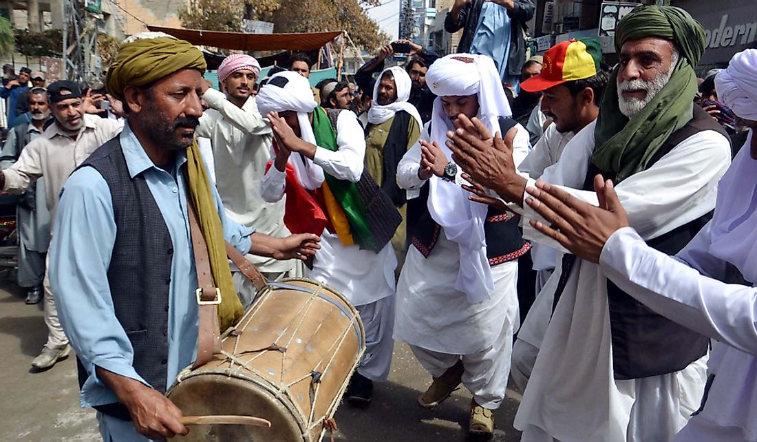 Baloch peoples in traditional dress celebrating Baloch Culture Day in Quetta, Pakistan. Editorial credit: Asianet-Pakistan / Shutterstock.com
