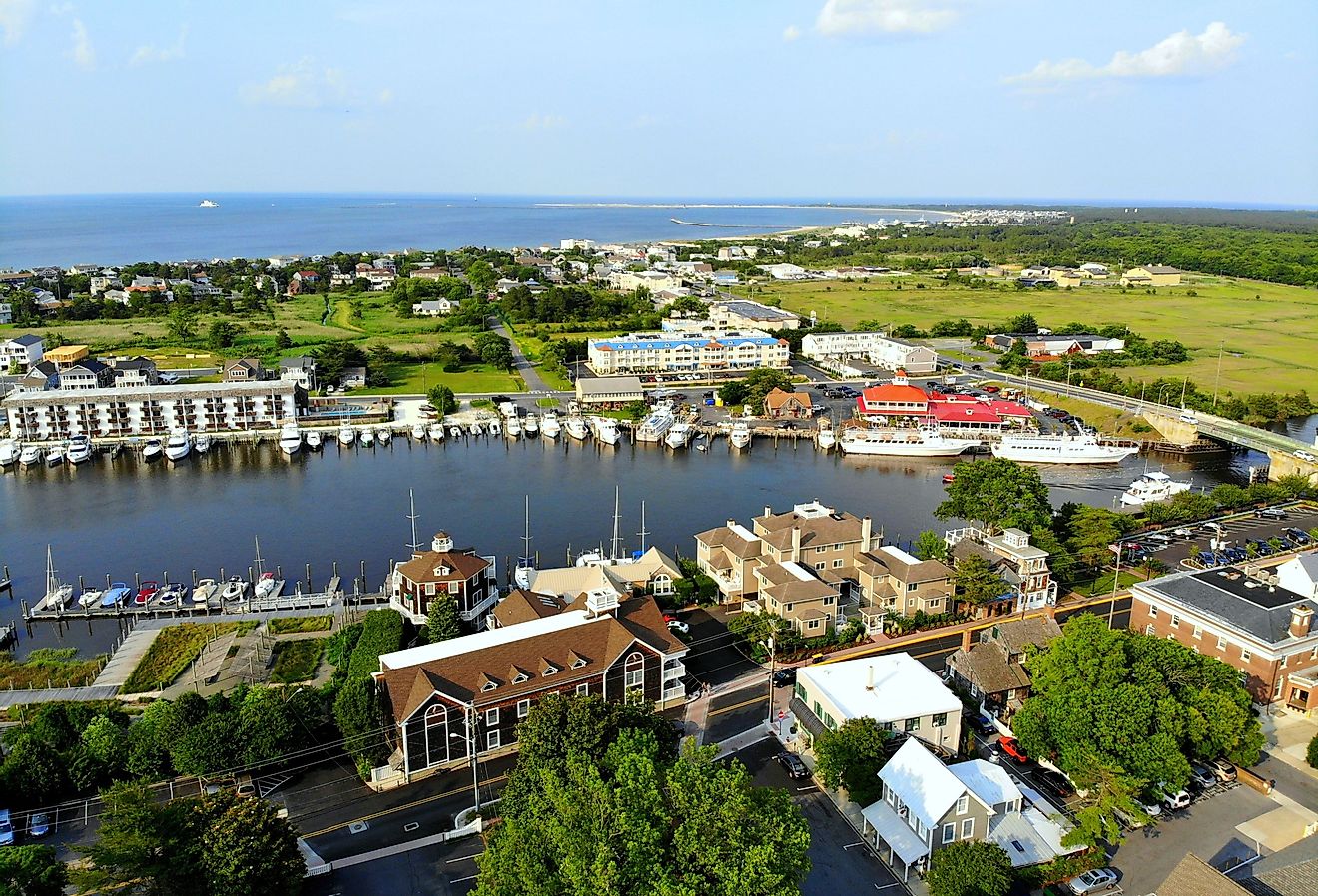 Aerial view of the beach town of Lewes with fishing port and waterfront residential homes along the canal. Image credit is Khairil Azhar Junos via Shutterstock.