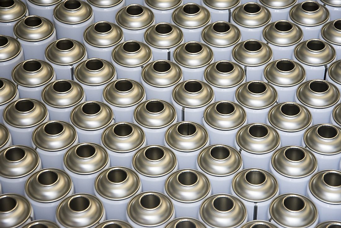 Rows of empty aerosol cans. 