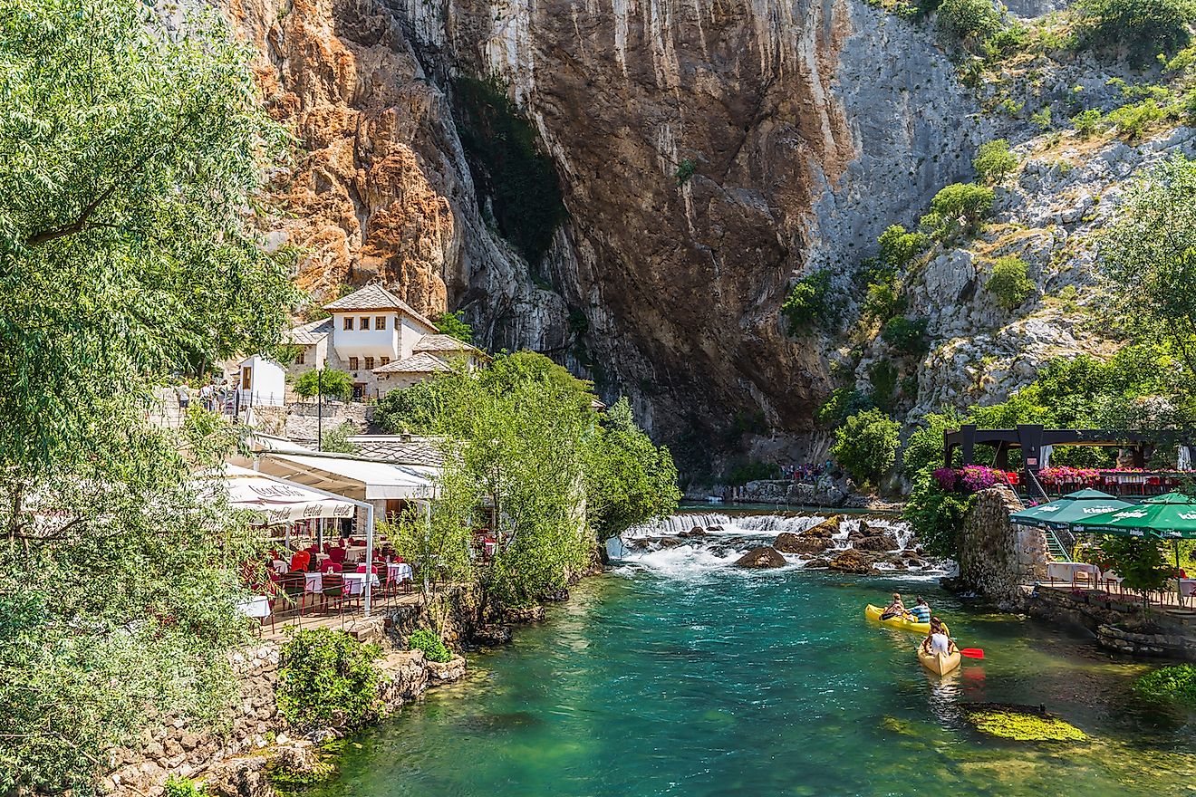 Relaxing restaurants near the Dervish house of Blagaj, Bosnia and Herzegovina. Image credit: RPBaiao/Shutterstock.com