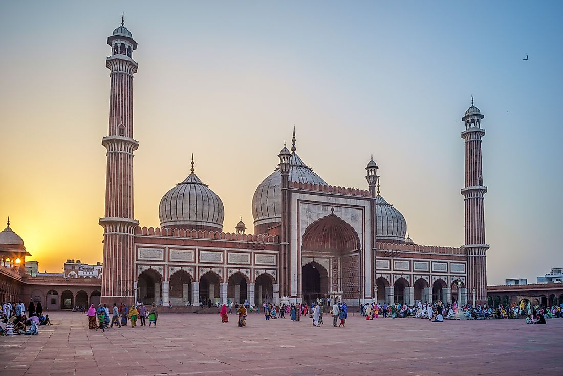 Crowds of evening worshippers gather outside of the Jama Masjid Mosque in Delhi, India.