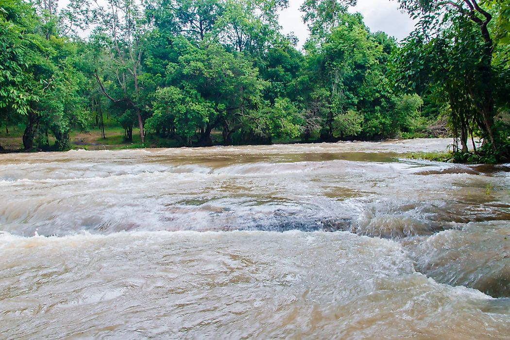 Flooding brought on by torrential monsoon rains leaves large parts of southern Asia underwater sweeping away homes, farmlands and livelihoods. Editorial credit: Robert Fowler / Shutterstock.com.