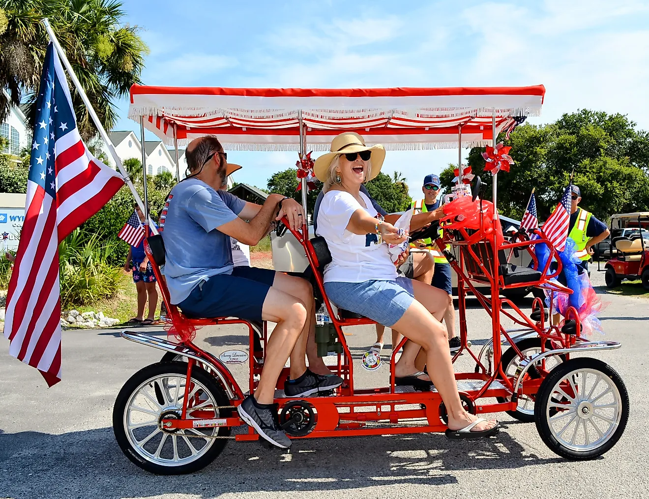 Surrey Bike with an American Flag in a Fourth of July Parade on Edisto Beach. Editorial credit: Coastal Soul Photography / Shutterstock.com