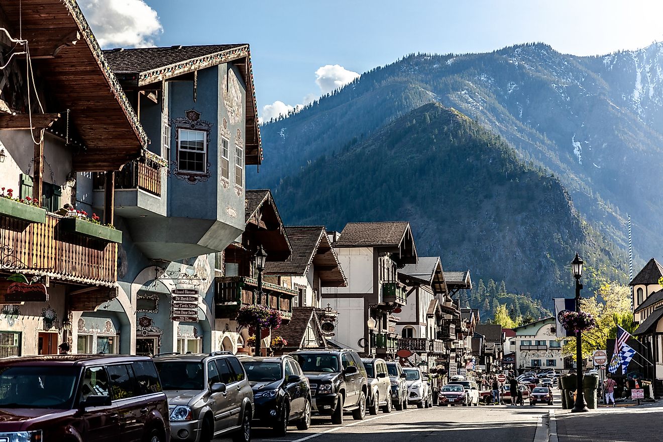 City street in Leavenworth, Washington with Cascade Mountains.