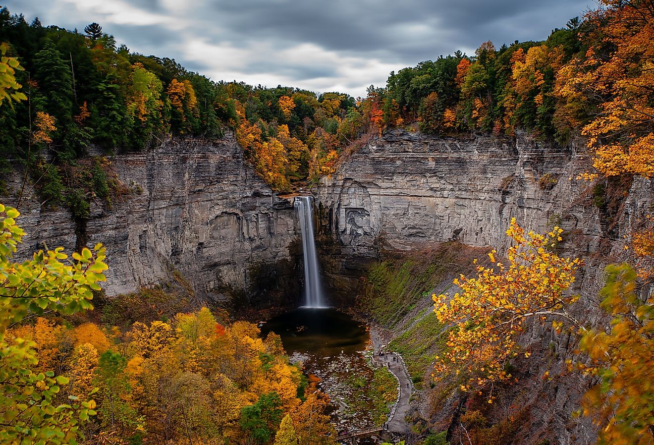 A scenic, autumn view of Taughannock Falls at Taughannock Falls State Park near Ithaca, New York.