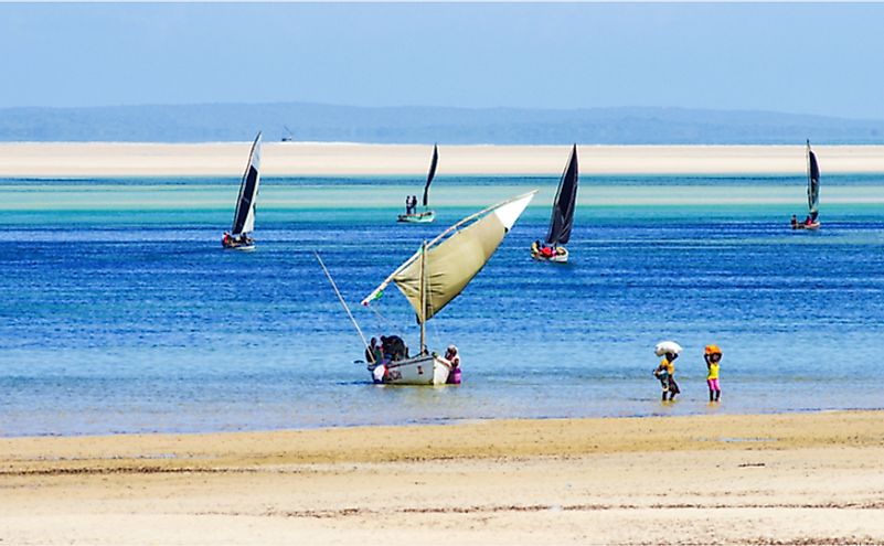 Fisherman working with low tide in Mozambique coastline.