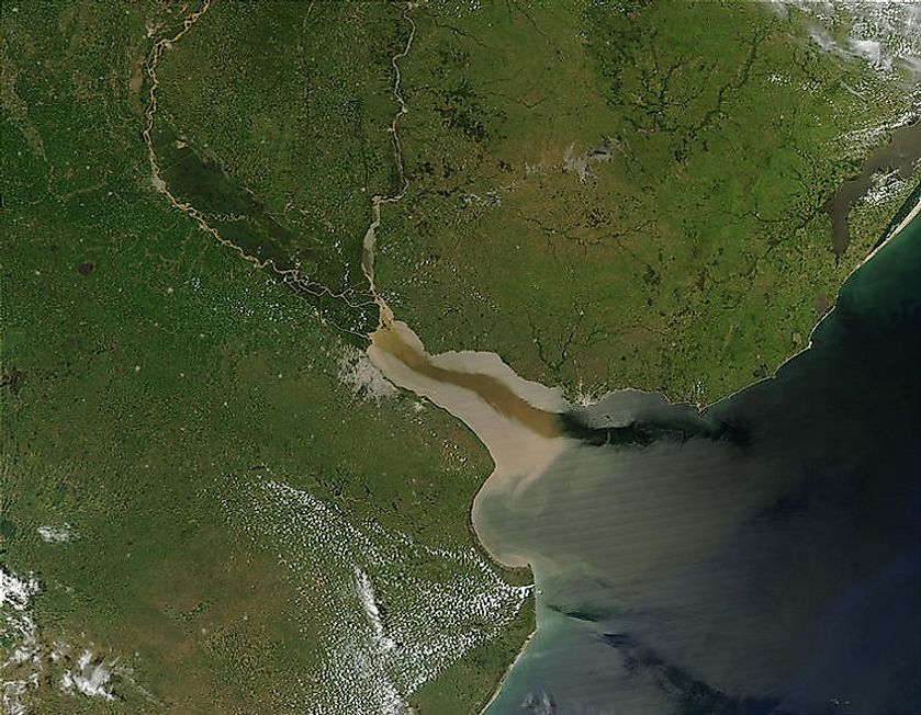 NASA photo of Uruguay and Paraná Rivers merging into the Río de la Plata estuary, which in turn is flowing out into the Atlantic Ocean.