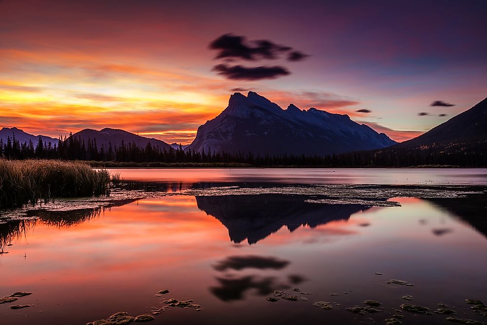 The rising sun heralds a new day over the Vermillion Lakes in Alberta, Canada's Banff National Park.