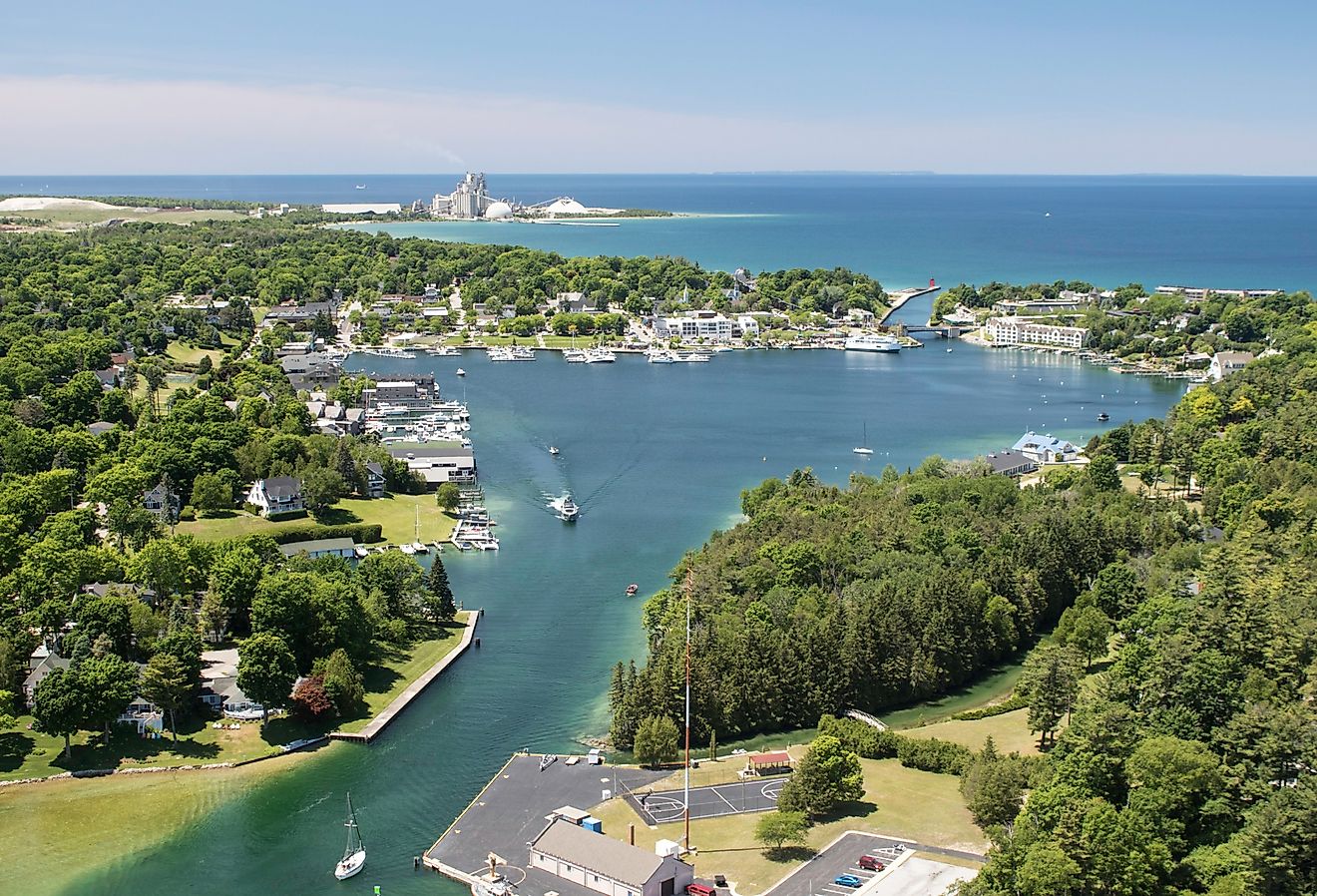 Aerial view of Round Lake in Charlevoix, Michigan, early summer, with boat traffic.