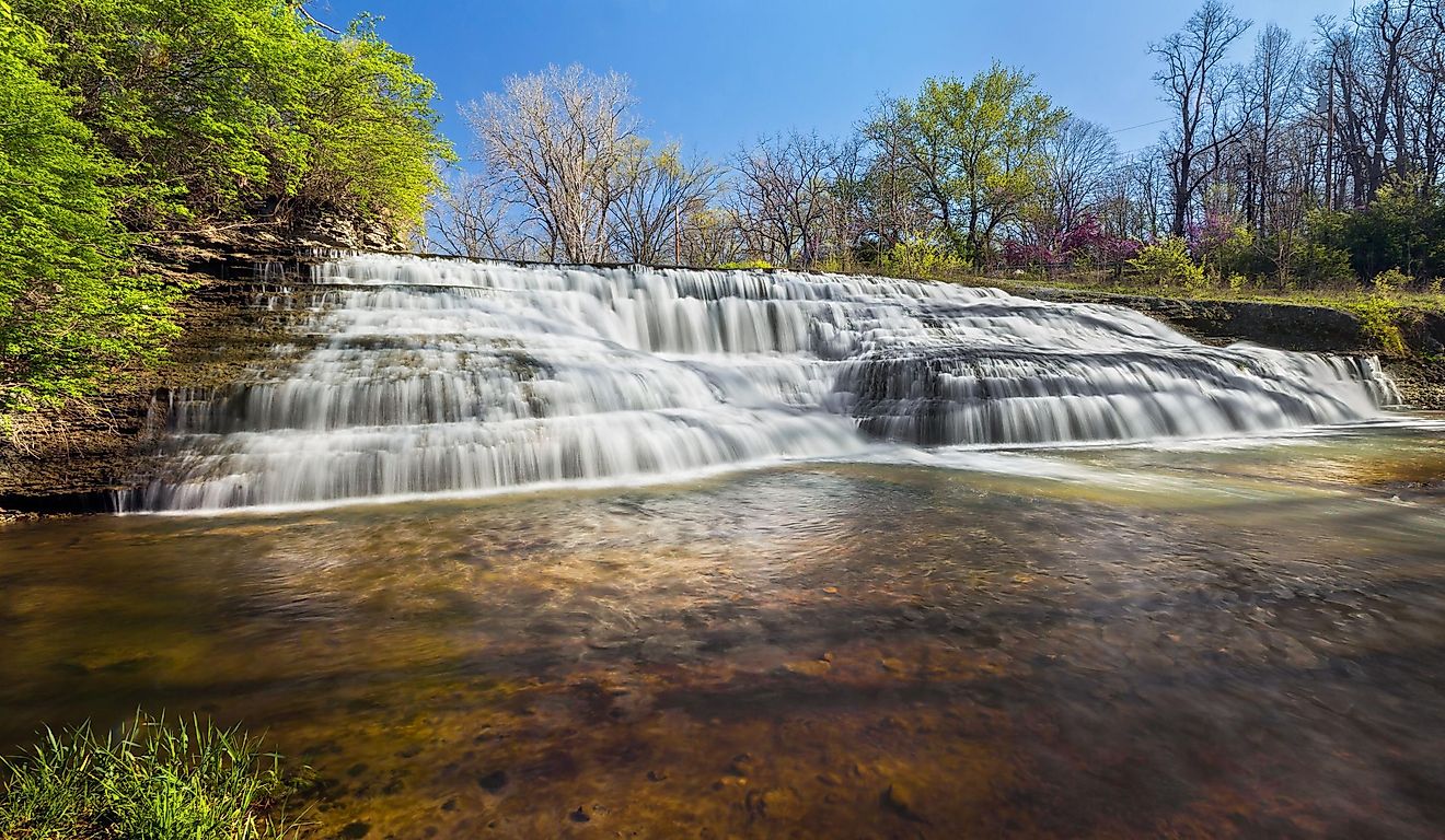 Richmond Indiana's Thistlethwaite Falls cascades over rocky ledges.